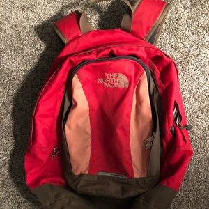North face backpack. Pink with brown detailing.